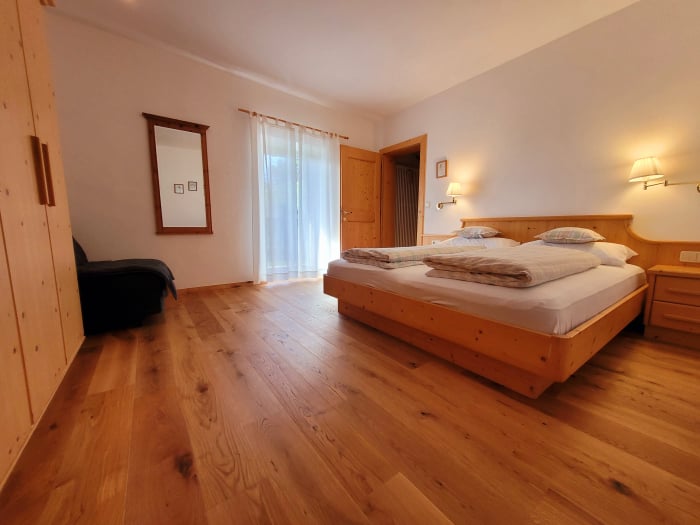 Schlafzimmer Berta Ferienwohnungen Waldegg Apartments Ritten