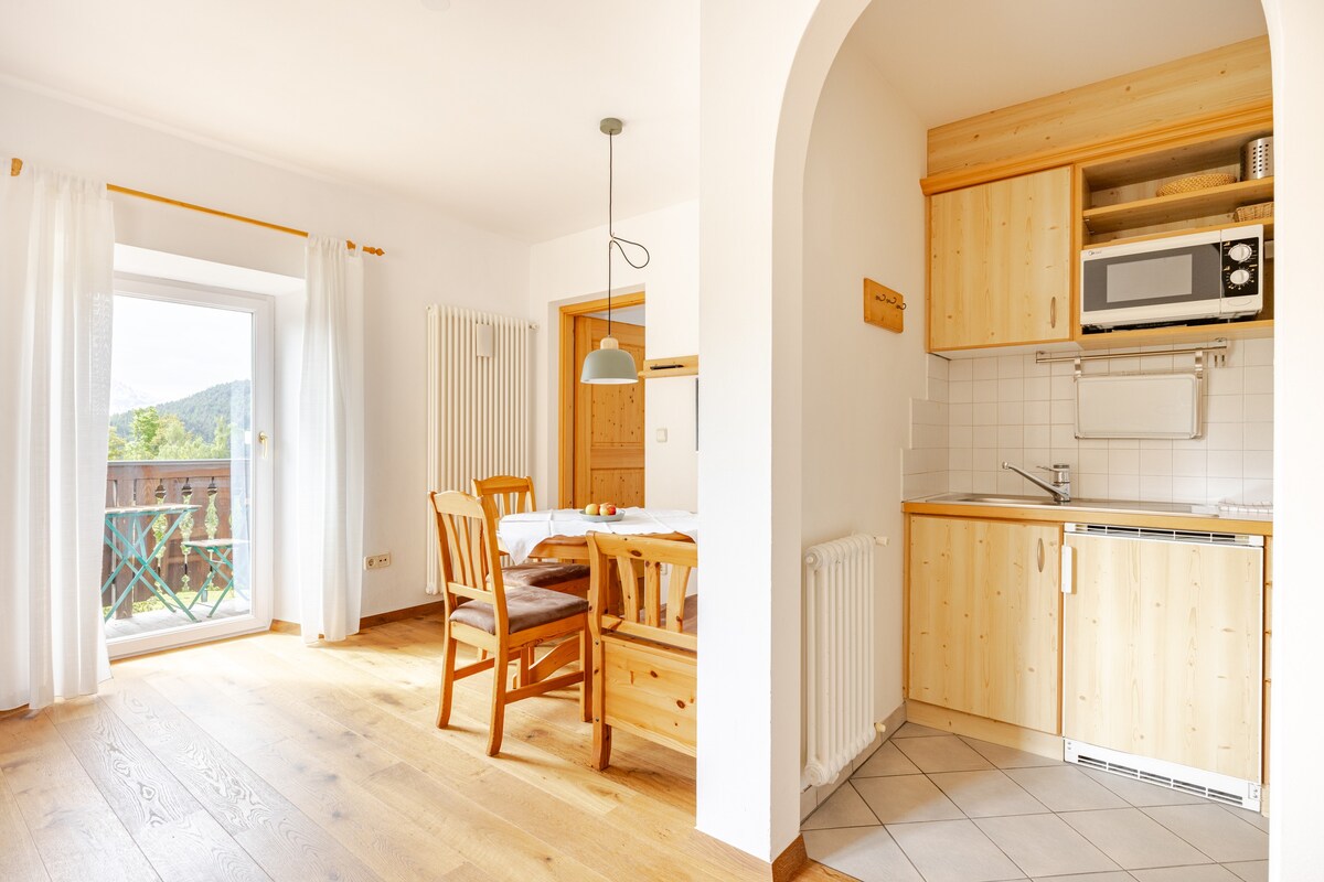 Wohnzimmer Gretl Ferienwohnungen Waldegg Apartments Ritten